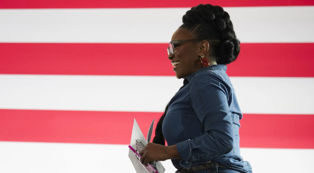 Congresswoman Jasmine Crockett takes the stage during a rally.