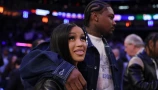 NFL Player Stefon Diggs (R) and rapper Cardi B (L) at Madison Square Garden.