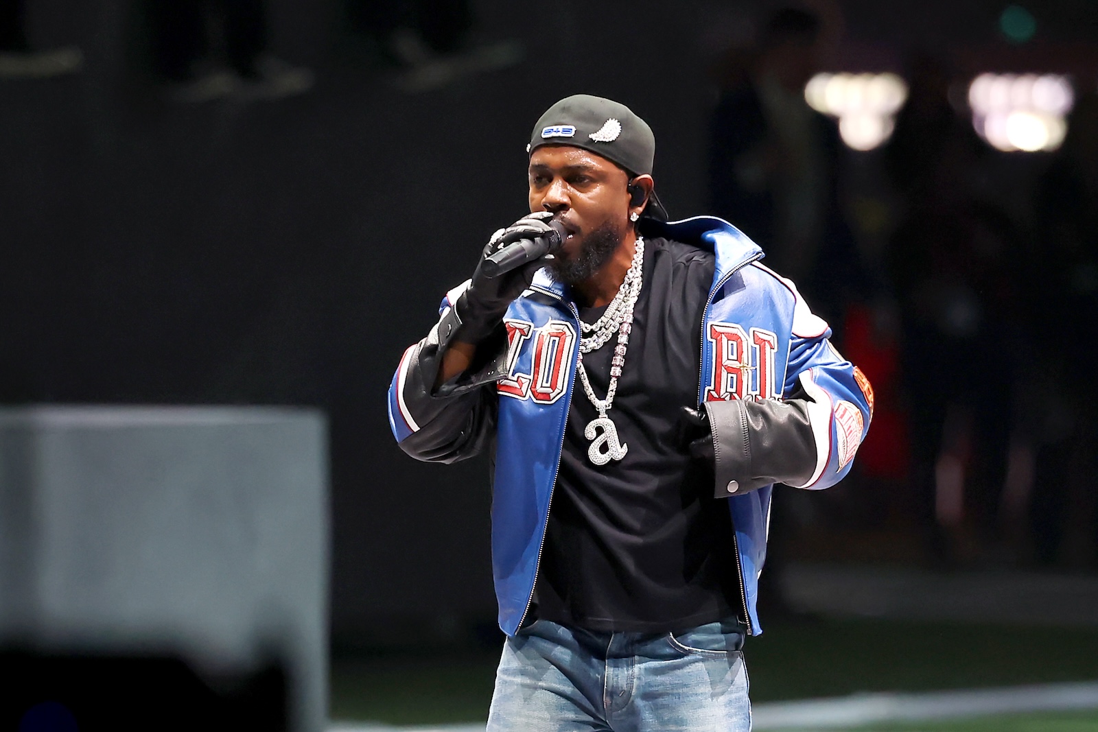 Kendrick Lamar’s Lowercase “a” Chain at the Super Bowl—A Shot at Drake or a Statement on America?