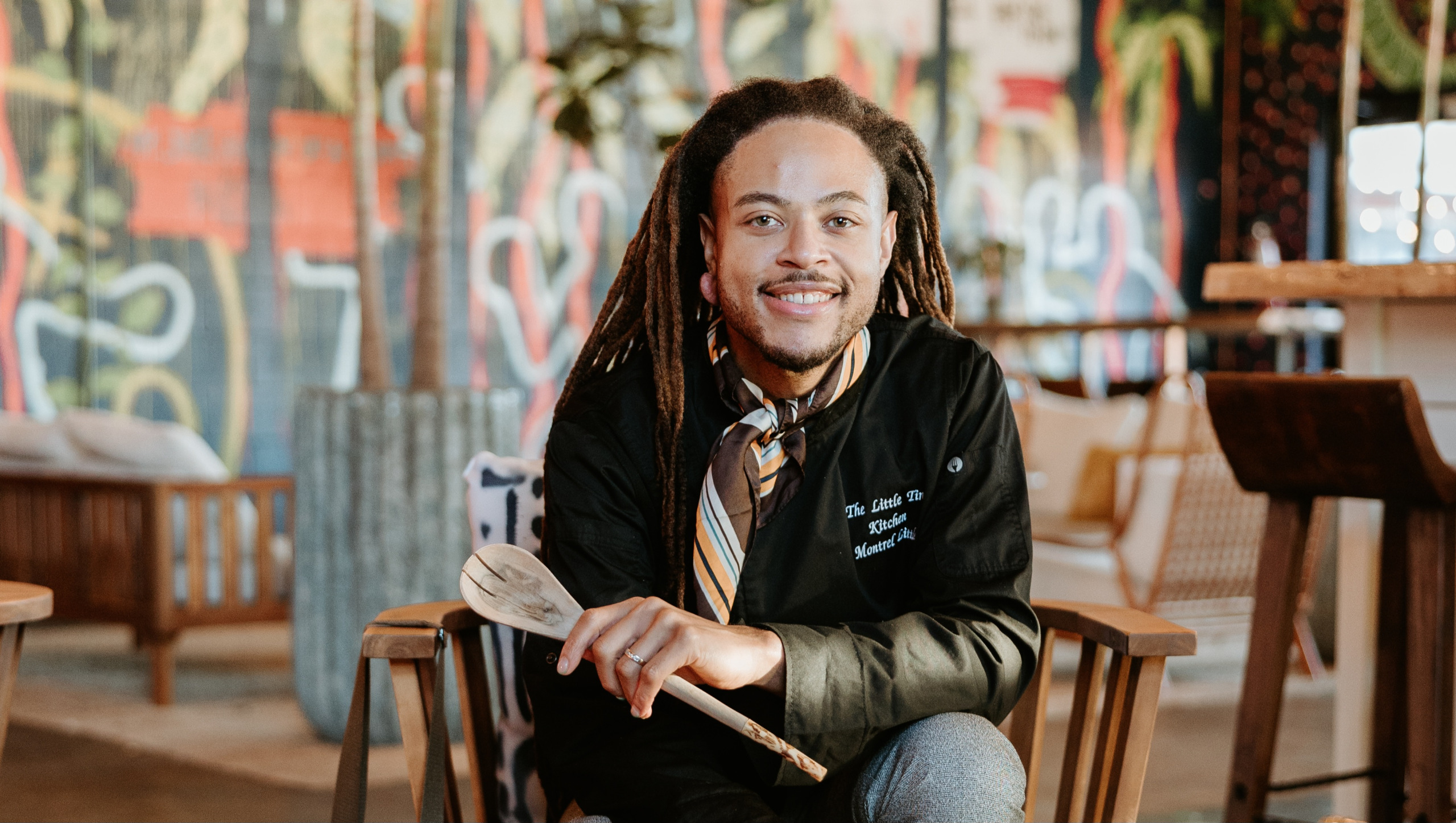 Chef Montrel Little in his kitchen, focused and intent.